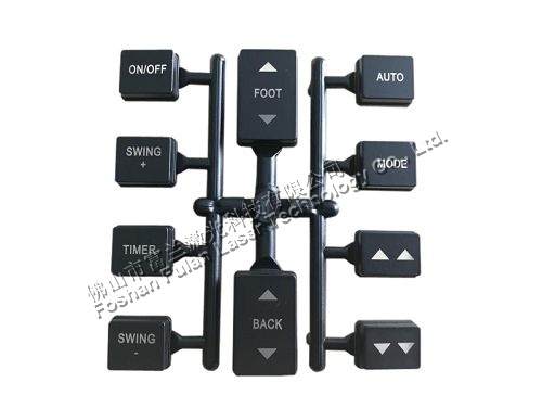 黑(hēi)色漆塑料按鍵激光(guāng)雕刻透光(guāng)圖形文(wén)字符